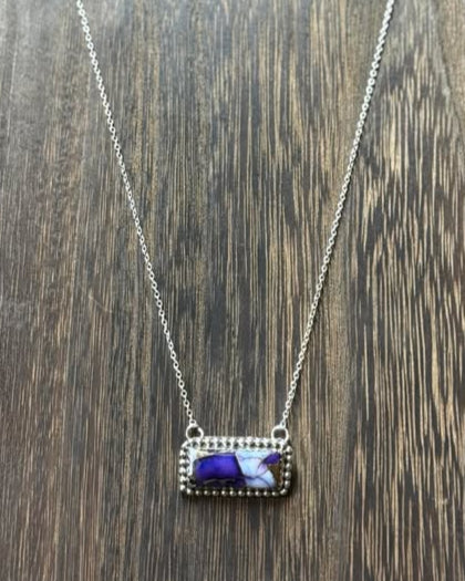 The Hada Collection Violet Rose Bar Necklace features a lovely violet rose bar pendant and a sterling silver 16" chain with a 2" extender for adjustable length.