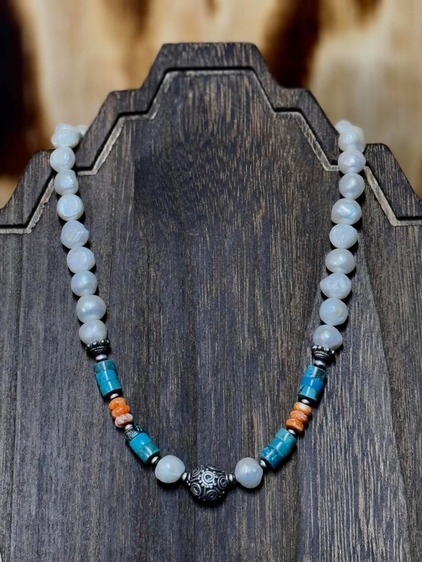 J Hartt Collection necklace with moonstone beads, turquoise, spiny shell accents, and Bali silver center bead.

