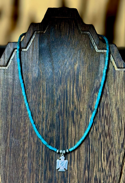 J Hartt Collection Thunderbird necklace with turquoise rondelle beads and sterling silver pendant, showcasing Navajo pearls, 16" with 1" extender.