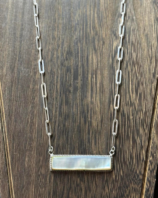 This elegant Mother of Pearl Bar Necklace features a beautiful mother of pearl bar pendant and a 20" heavy sterling silver chain.